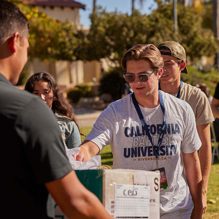 Prospective students at spring preview check in
