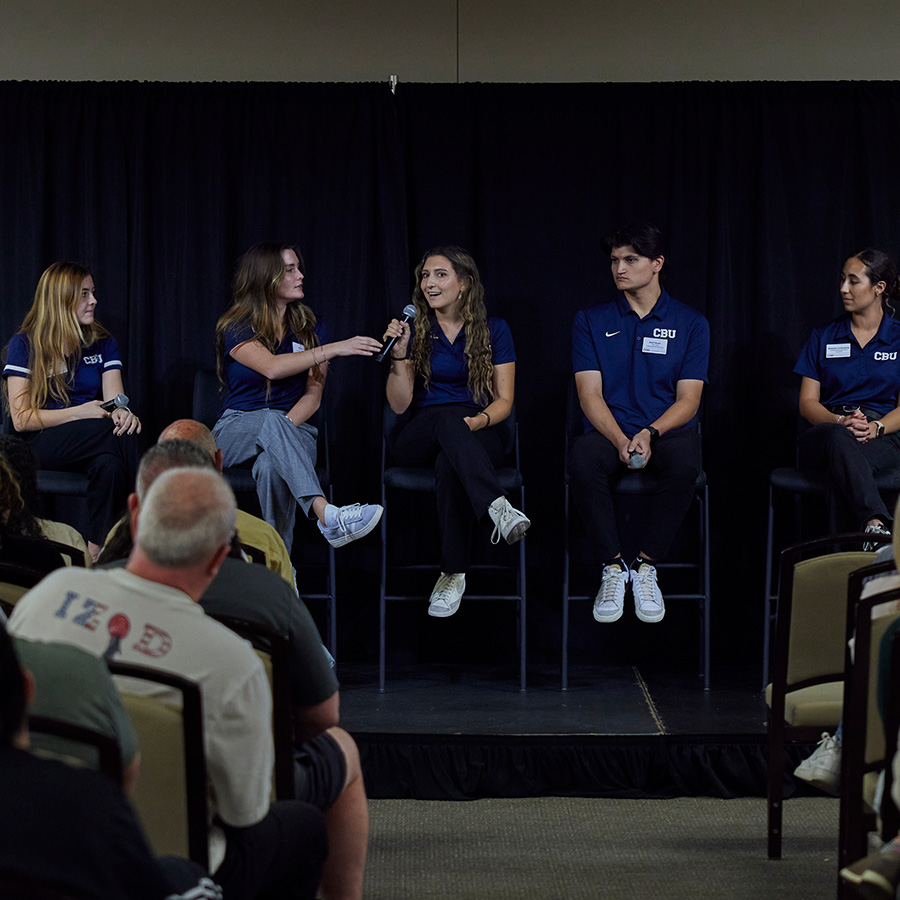CBU Guides answering questions on stage