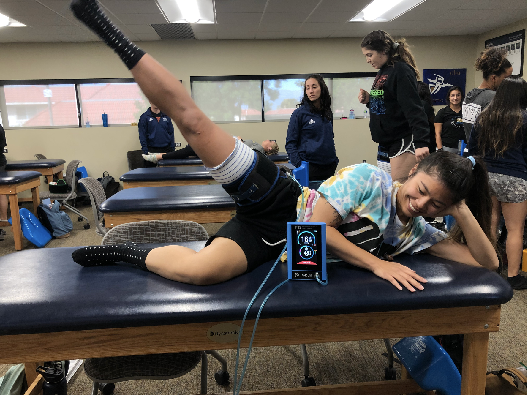 girl on table in athletic training room