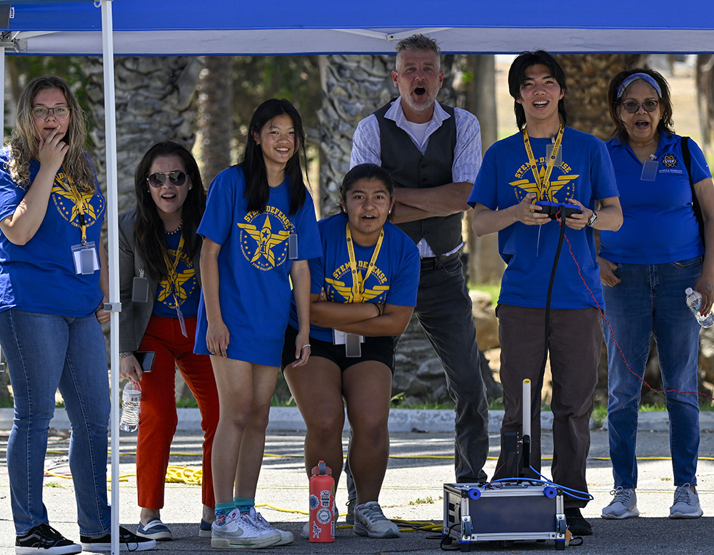 Students watch rockets launch