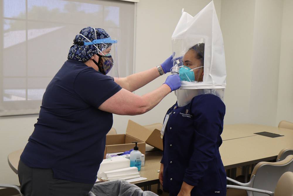 Nursing student being fitted