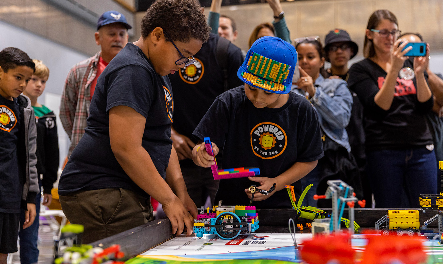 Bustling crowds of parents and students ages 6-14 brought the halls of the Dennis and Carol Troesh Engineering Building to life on Dec. 2 for the First Lego League Regional Tournament held at California Baptist University.