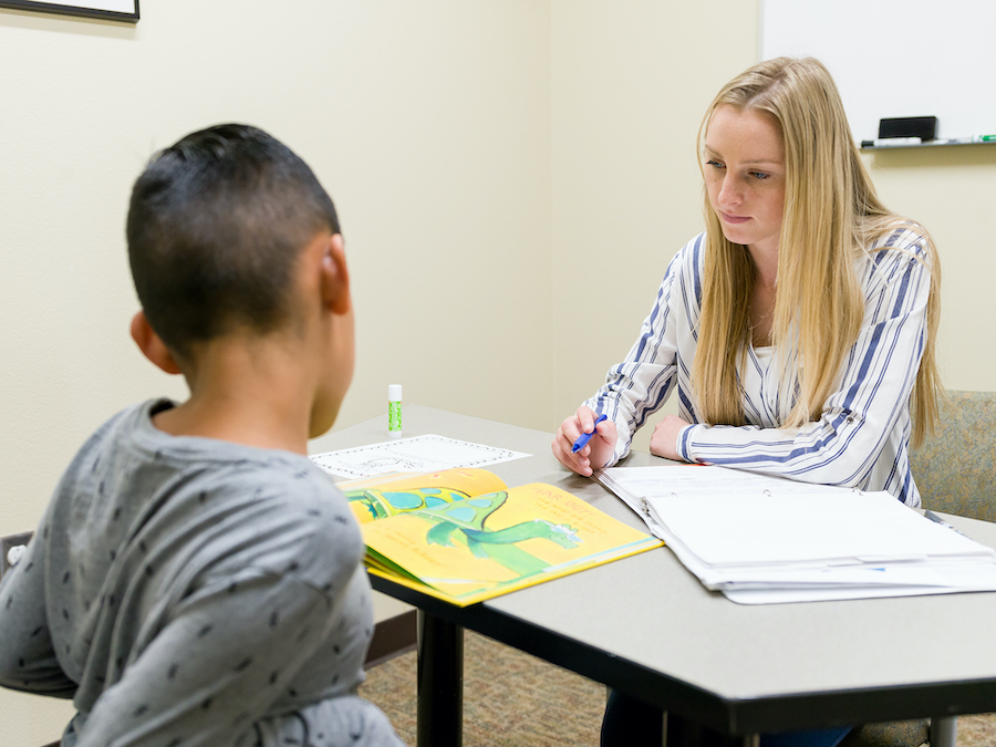 a cbu student with a young student