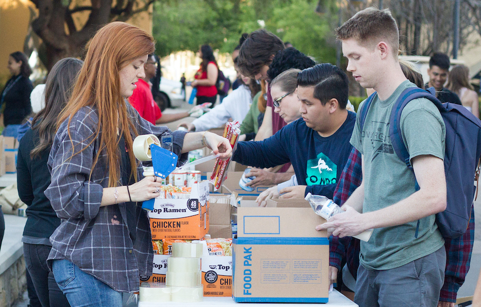 Hundreds of students at California Baptist University lined up along Stamps Courtyard and packed some 200 boxes filled with non-perishable foods on April 2. 