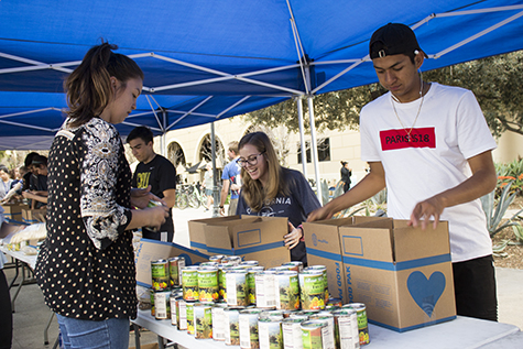 CBU students pack hundreds of food boxes for families in need 