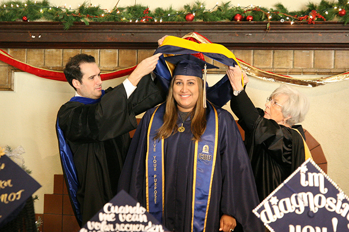 Graduate hooding ceremonies celebrate students’ achievements at                       CBU 