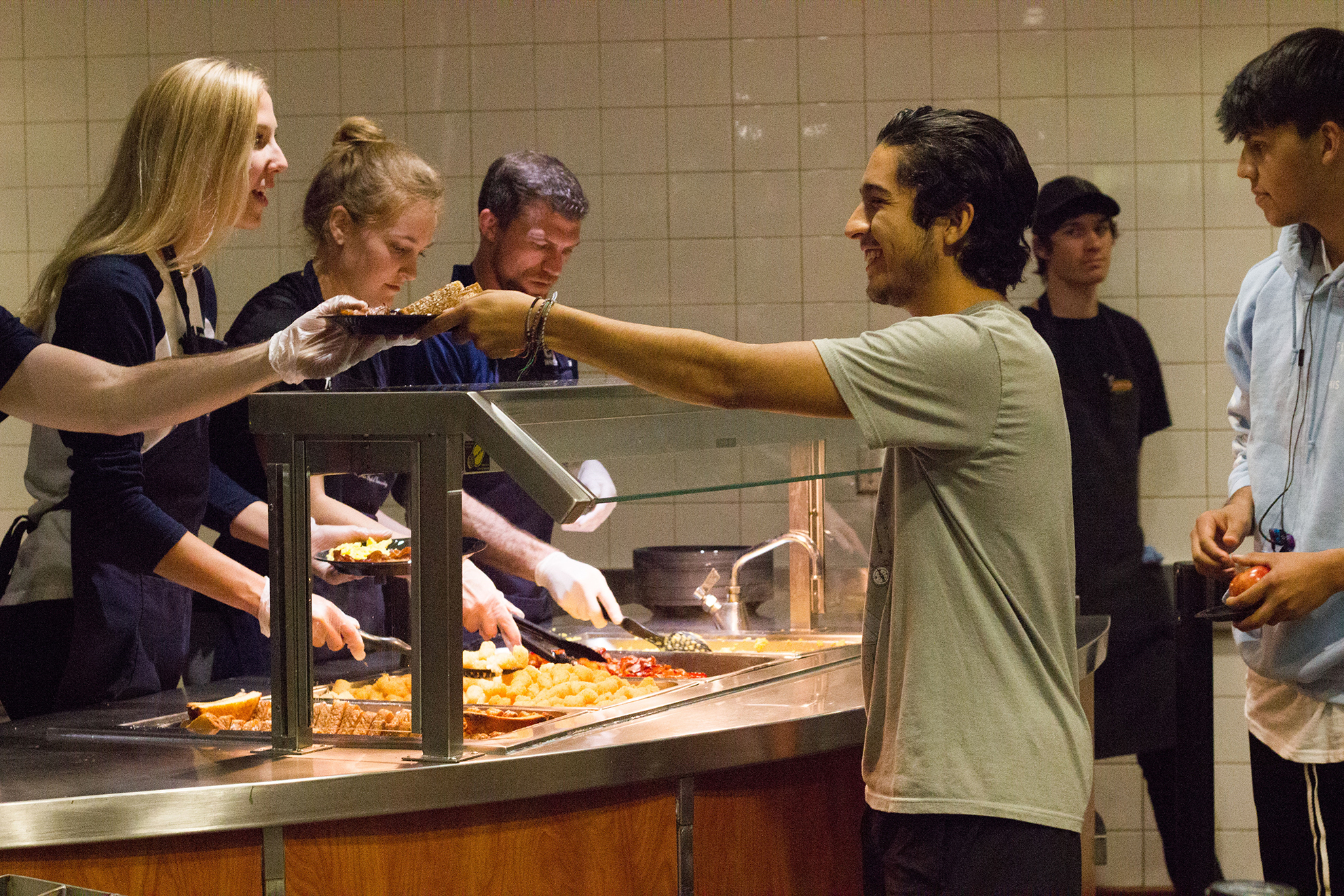 CBU faculty and staff serve a late-night breakfast to support students during finals week