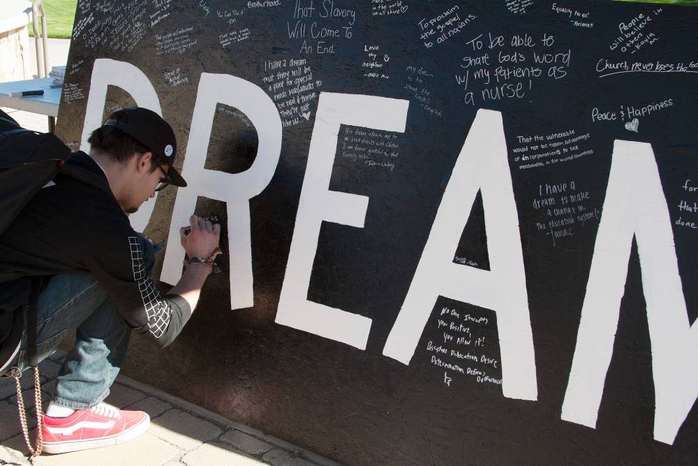 California Baptist University students write down their own                       dreams or reflect on the Martin Luther King Jr. “I Have a Dream” speech.