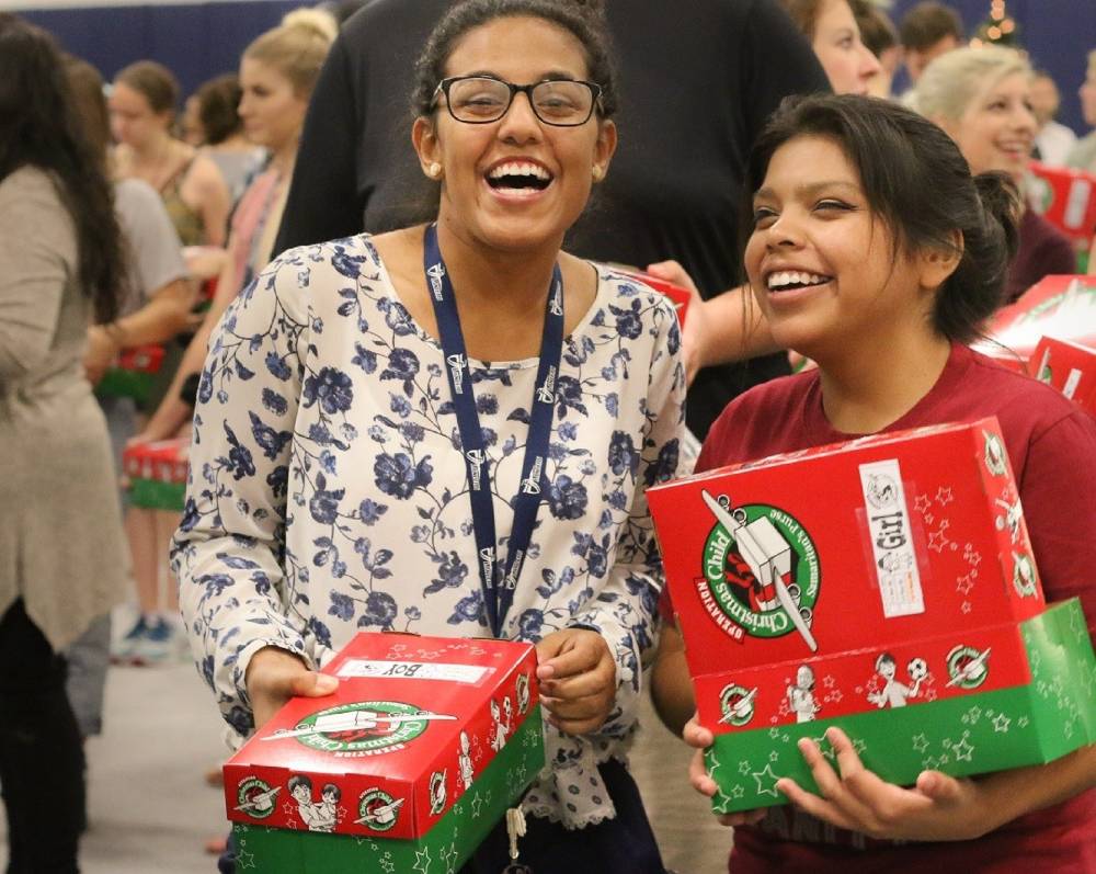 Christmas charity was on the minds of California Baptist                       University students, faculty, staff and their families on Nov. 10 as they worked                       in groups to pack shoeboxes for Operation Christmas Child (OCC).