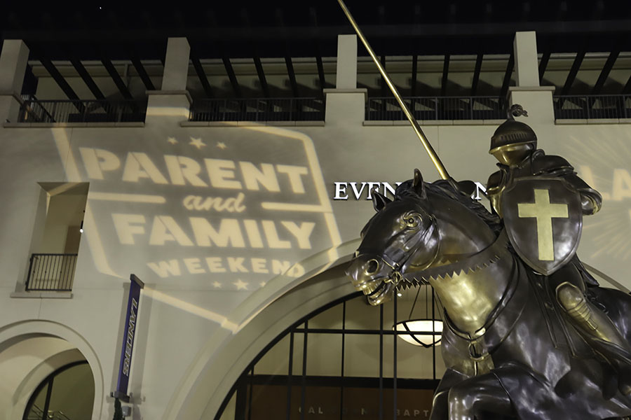 Lancer Statue with Parent and Family Weekend logo in background