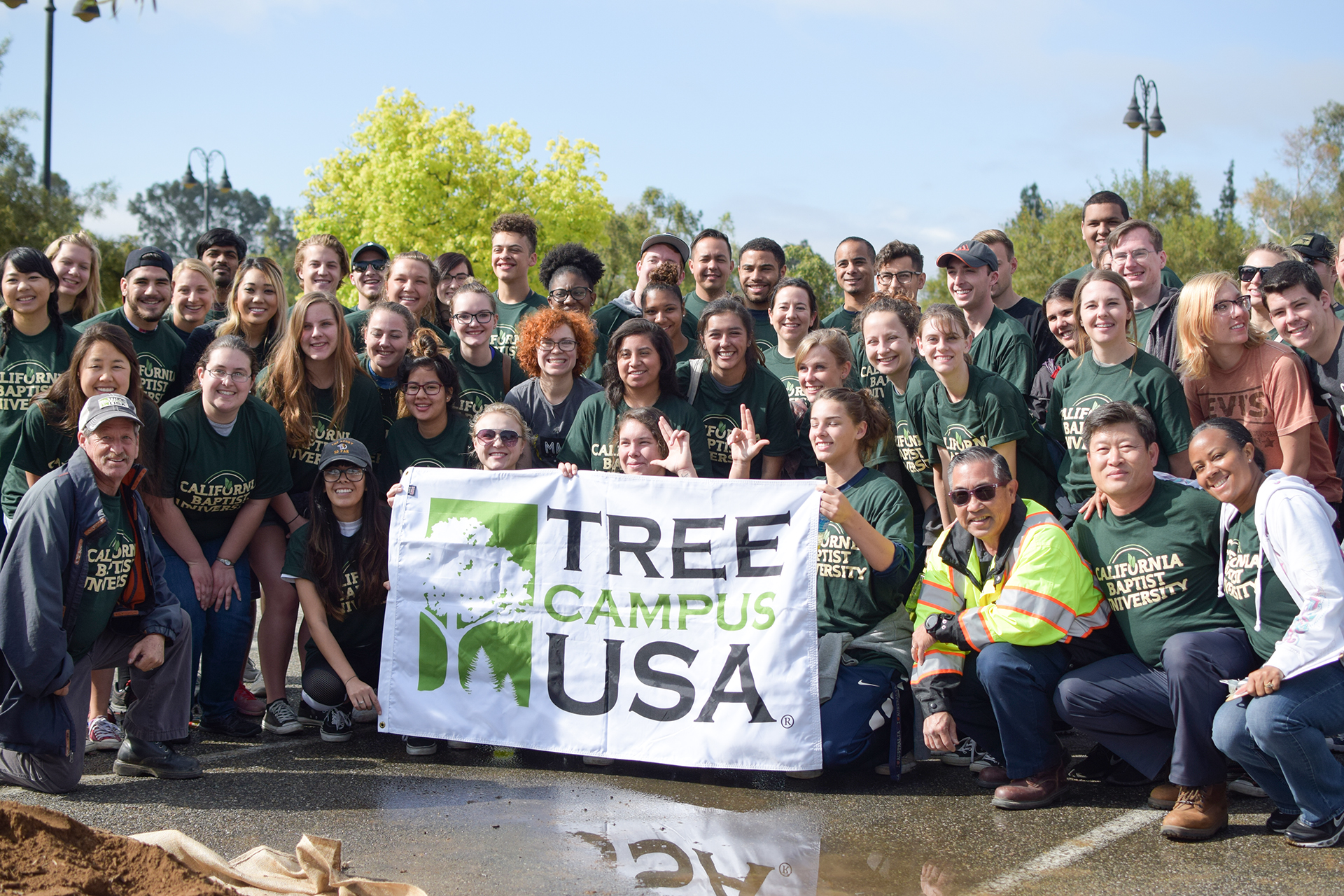 Sixty students, staff and faculty from California Baptist University celebrated Spring Arbor Day by planting 14 trees in various parking lot areas on April 8.