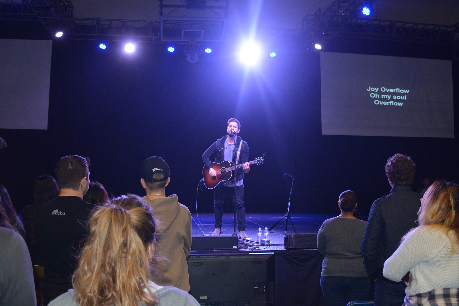 Travis Ryan performing on stage