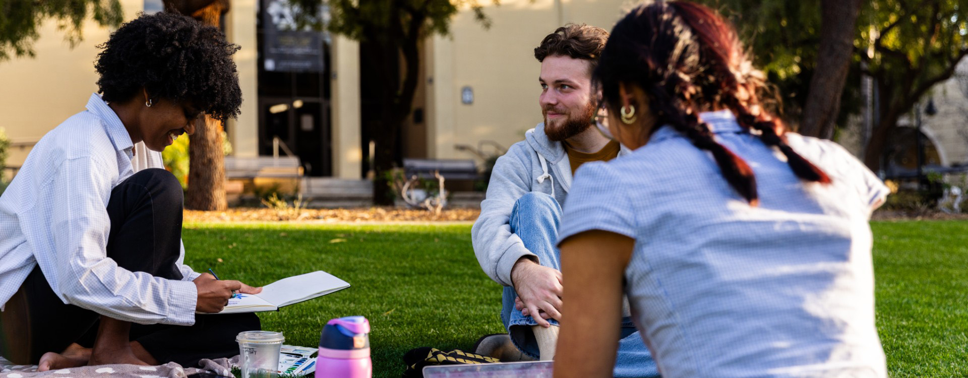 Students sitting on Lawn