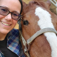 Photo of Amber and a horse