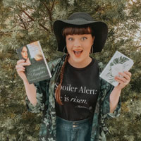 Photo of Jenna holding two books
