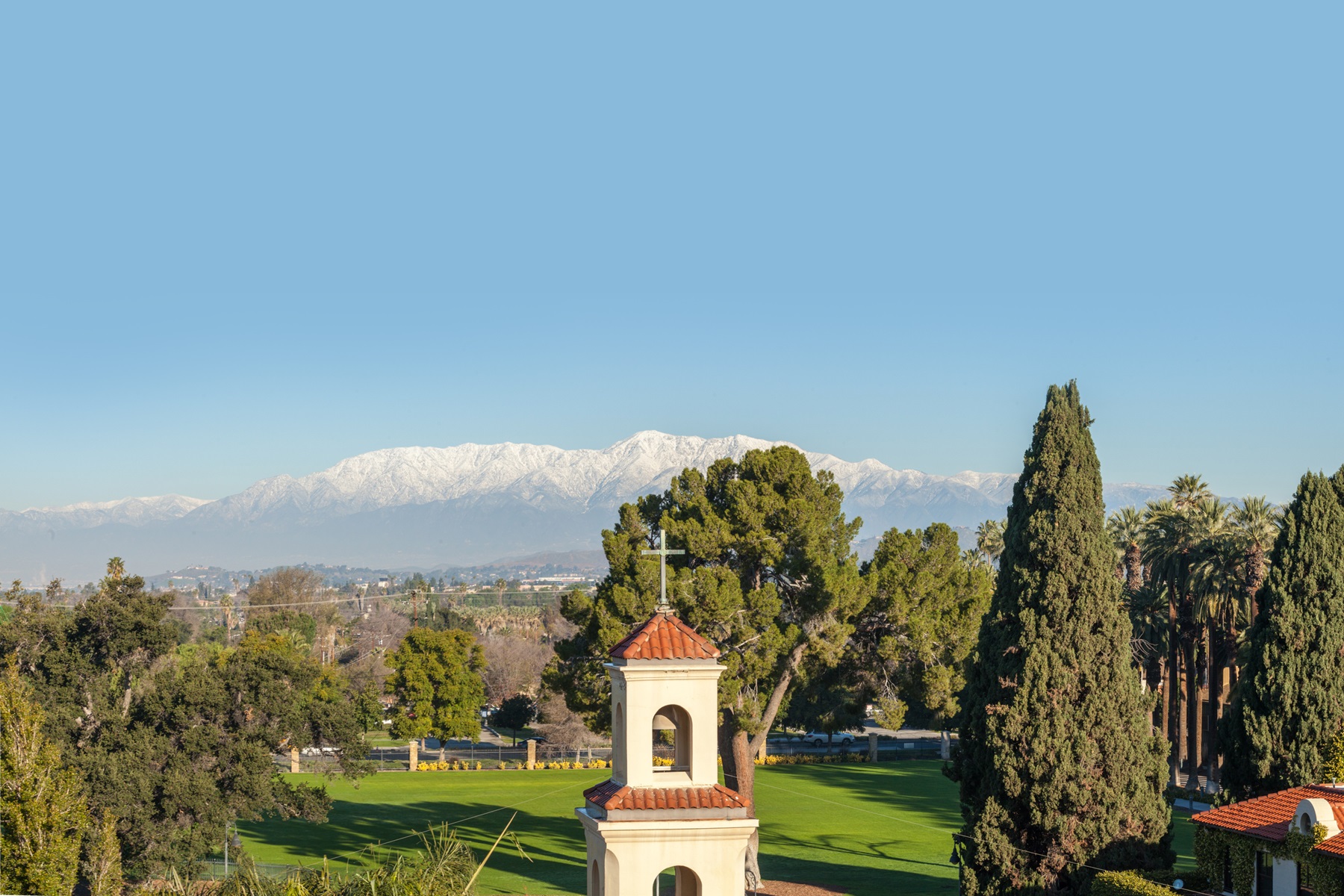 CBU belltower with snowy mountains in the background